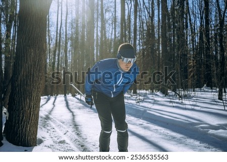 Similar – Young man running outdoors during workout in a forest