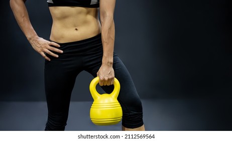 Athlete Woman Doing Exercise With Kettlebell In Fitness Gym. Strength Training Class