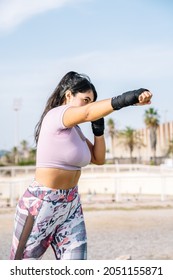 Athlete Woman Making The Gesture Of Strength With Her Arm