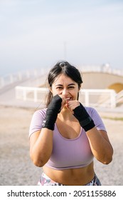 Athlete Woman Making The Gesture Of Strength With Her Arm