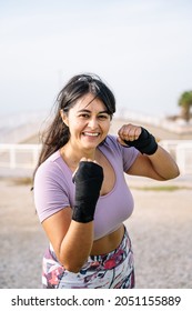 Athlete Woman Making The Gesture Of Strength With Her Arm