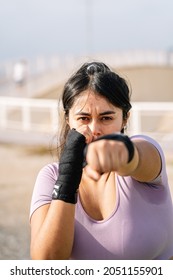 Athlete Woman Making The Gesture Of Strength With Her Arm