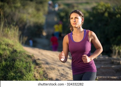 Athlete Woman Running In Nature Jogging Path Determined Serious Focused Mental Strength