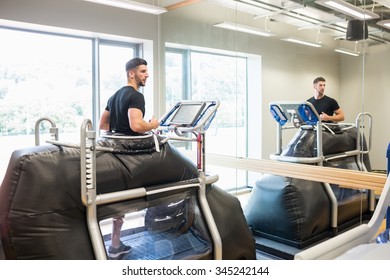 Athlete Working Out On An Anti Gravity Treadmill At The Gym