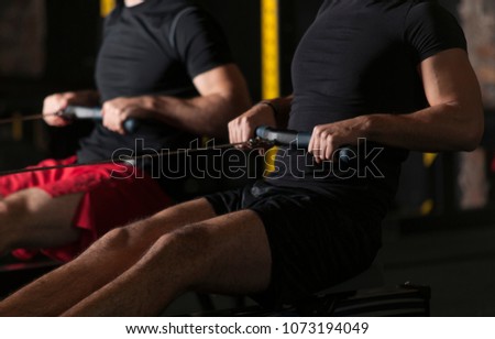 Athletes doing rowing practice