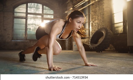 Athletic Beautiful Woman Does Running Plank as Part of Her Fitness, Bodybuilding Gym Training Routine.