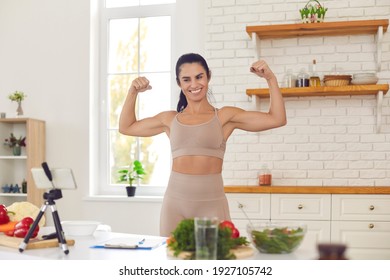 Athletic Fitness Coach And Blogger Filming Video Blog, Sharing Dieting And Eating Habits Tips. Happy Young Woman Recording Vlog, Showing Fit Body And Setting Example Of Healthy Lifestyle And Success