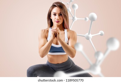 Athletic Fitness Woman Standing Near White Molecule Chain. Good Metabolism Concept.