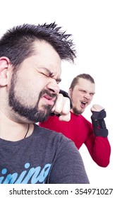 Athletic man beating another man
