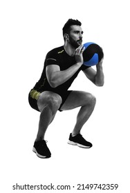 Athletic Man Doing Squats With Medicine Ball Isolated On White