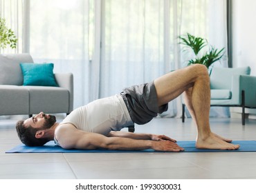 Athletic man exercising at home, fitness and sports concept