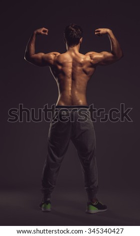 Similar – Young male bodybuilder posing