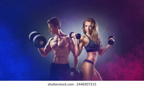  Athletic man and woman with a dumbells showing muscles. Neon light. - Powered by Shutterstock