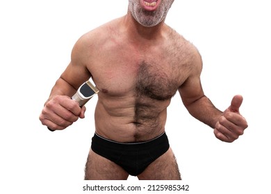 An Athletic Older Caucasian Man, Bare Chested Hairy, Holding A Razor In His Hand, Half Shaved Chest. Isolated On White Background.