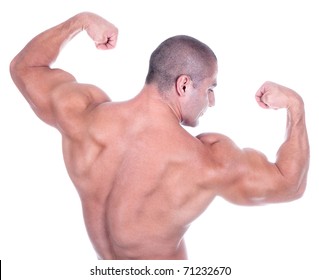 Athletic Sexy Attractive Male Body Builder, Demonstrating Contest Pose. Studio Shot