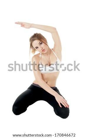Athletic woman doing sport exercise over white background. Healthy lifestyle concept. 