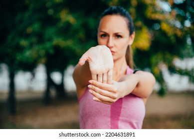 
Athletic Woman Exercise And Stretching In The Park. Female Athlete Person, Sport Active In Nature. Real People, Green Bokeh Background. Self Care, Body Positive And Life Balance Concept.