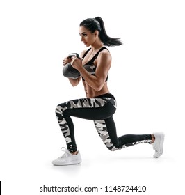 Athletic woman with kettlebell doing a lunges. Photo of latin woman in silhouette isolated on white background. Strength and motivation. Side view.