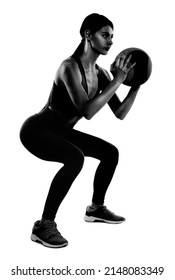 Athletic Woman With Medicine Ball Isolated On White