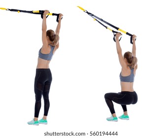 Athletic woman performing a functional exercise with suspension cable.