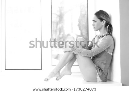 Similar – Woman looking from her balcony the city