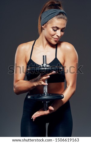 Athletic woman workout exercises cardio lifting