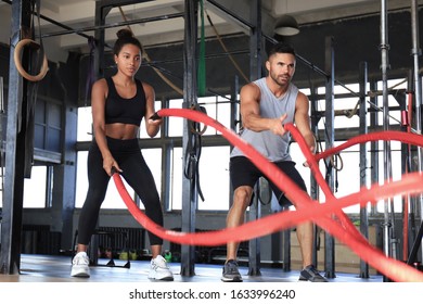 Athletic Young Couple Battle Rope Doing Stock Photo 1633996240 ...