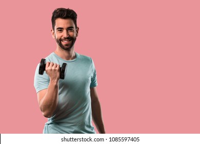 Athletic Young Man Doing Exercise Dumbbell