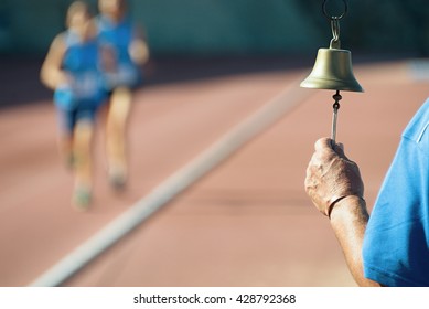 Athletics Bell Final Round In The Background Two Runners