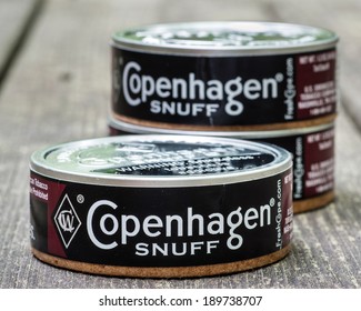 ATLANTA - APRIL 28, 2014: Cans of Copenhagen Snuff, a smokeless tobacco product.