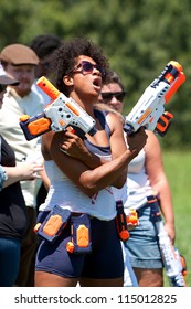 ATLANTA, GA - JULY 28:  Unidentified People Take Part In A Water Gun Battle Called The Fight4Atlanta, A Squirt Gun Fight Between Dozens Of Locals At Freedom Park On July 28, 2012 In Atlanta.