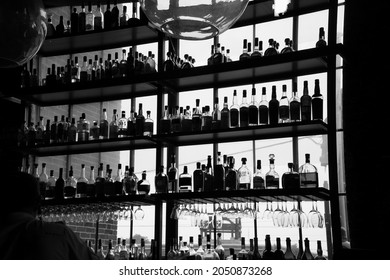 Atlanta, GA- June 18,2021- Liquor bottles on display on the self of an upscale bar in Ponce city market in Atlanta