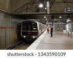 Atlanta, GA / USA - March 13, 2019: MARTA Transit train arriving at Lenox station.