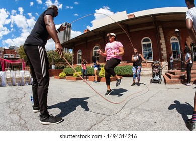 Atlanta, GA / USA - September 15, 2018:  A Woman Jumps Rope Double Dutch Style At The Pretty Girls Sweat Fest, On September 15, 2018 In Atlanta, GA. 