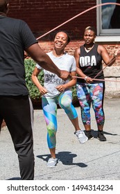 Atlanta, GA / USA - September 15, 2018:  A Young Woman Jumps Rope Double Dutch Style At The Pretty Girls Sweat Fest Fitness Event On September 15, 2018 In Atlanta, GA. 