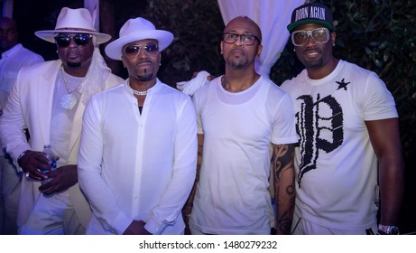 Atlanta, GA/United States-August 13, 2019: Group Of Men Posing At An All White Party.