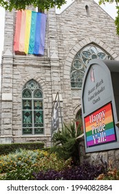 Atlanta, GAUSA - October 12, 2019:  A Gay Pride Flag Hangs From A Methodist Church, And Digital Signage Says 