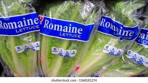 ATLANTA, GEORGIA - APRIL 13, 2019 : Fresh Romaine Lettuce On Display At Local Grocery Store.