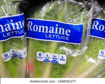 ATLANTA, GEORGIA - APRIL 13, 2019 : Fresh Romaine Lettuce On Display At Local Grocery Store.