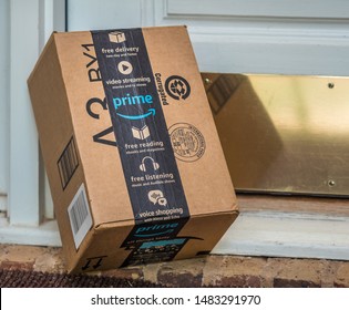 ATLANTA, GEORGIA - AUGUST 19, 2019 :  Amazon Prime Box Delivered To Residential Doorstep. Amazon Offers Free Package Delivery To It's Prime Members.