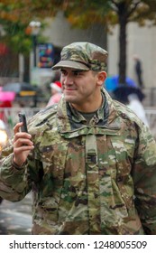 Atlanta, Georgia - December 1, 2018: A Soldier In The U.S. Army Corps Of Engineers Marches In The Rain In The 2018 Children's Healthcare Of Atlanta Christmas Parade.