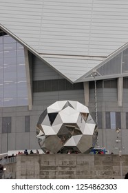 Atlanta, Georgia - December 10, 2018: Fans Watch The Parade And Rally For The Atlanta United FC, MLS Cup Champions, In Front Of The Telstar Soccer Ball Sculpture Beside Mercedes Benz Stadium.