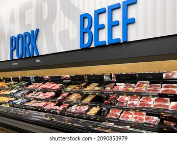 ATLANTA, GEORGIA - DECEMBER 14, 2021 : Fresh Beef And Pork Sign Above A Refrigerated Display Case At An American Grocery Store Supermarket.