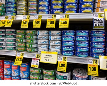 ATLANTA, GEORGIA - JANUARY 02, 2022 : Canned Tuna Fish On Retail Display Shelf At An American Grocery Store Supermarket.