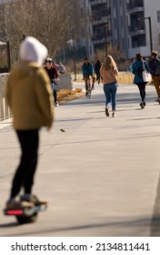 ATLANTA, GEORGIA - MARCH 6, 2022: The Atlanta Beltline is excellent for walking, skating, riding electric skate boards and scoters to witness the scenic views that Atlanta has to offer.