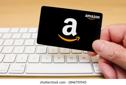 ATLANTA, GEORGIA - NOVEMBER 3, 2020 : Amazon gift cards can be used to purchase items from the Amazon.com website via computer or mobile device.