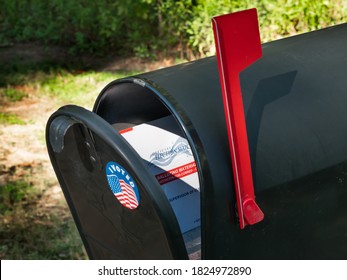 ATLANTA, GEORGIA - SEPTEMBER 30, 2020 : Absentee Voter Vote By Mail Ballot In U.S. Post Office Residential Mailbox.