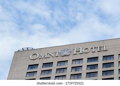 Atlanta, Georgia, USA - January 16, 2020: Omni Hotel Sign With Copy Space On Top. Omni Hotels & Resorts Is An American Privately Held, International Luxury Hotel Company. 