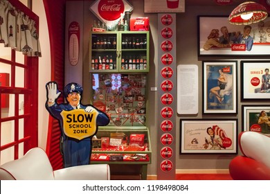 Atlanta, Georgia, USA – July 26, 2015: Colorful Horizontal Shot Of Part Of The Memorabilia Placed In A Built Living Room At The World Of Coca-Cola Museum 