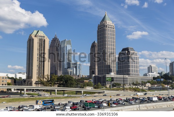 ATLANTA,\
GEORGIA/USA - OCTOBER 11, 2014: Atlanta skyline and Interstate 75\
and 85. The history of skyscrapers in Atlanta began with the\
completion in 1892 of the Equitable\
Building.